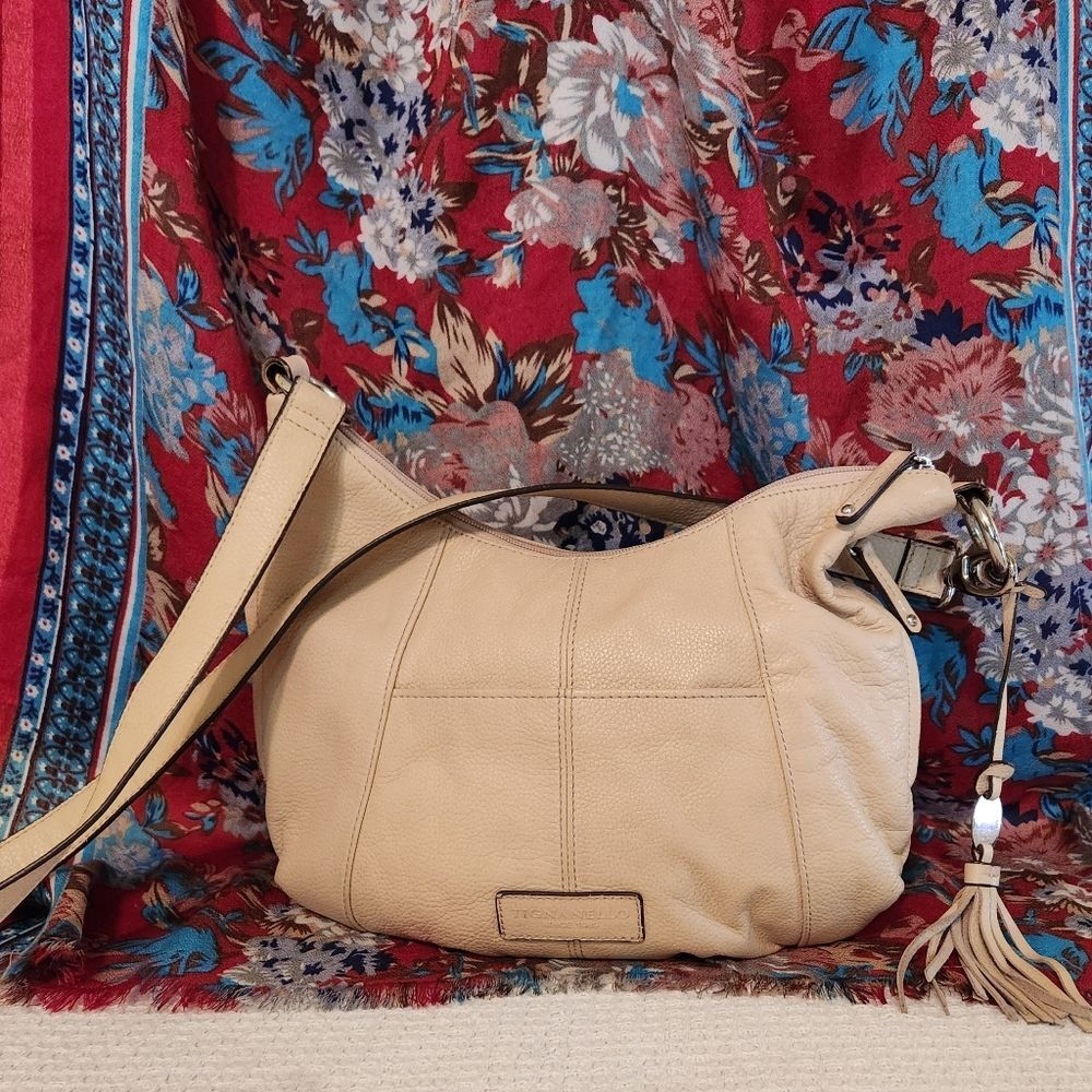 Tignanello cream colored satchel. Side pockets.